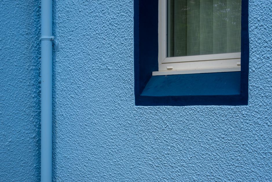 Exterior wall of a painted house