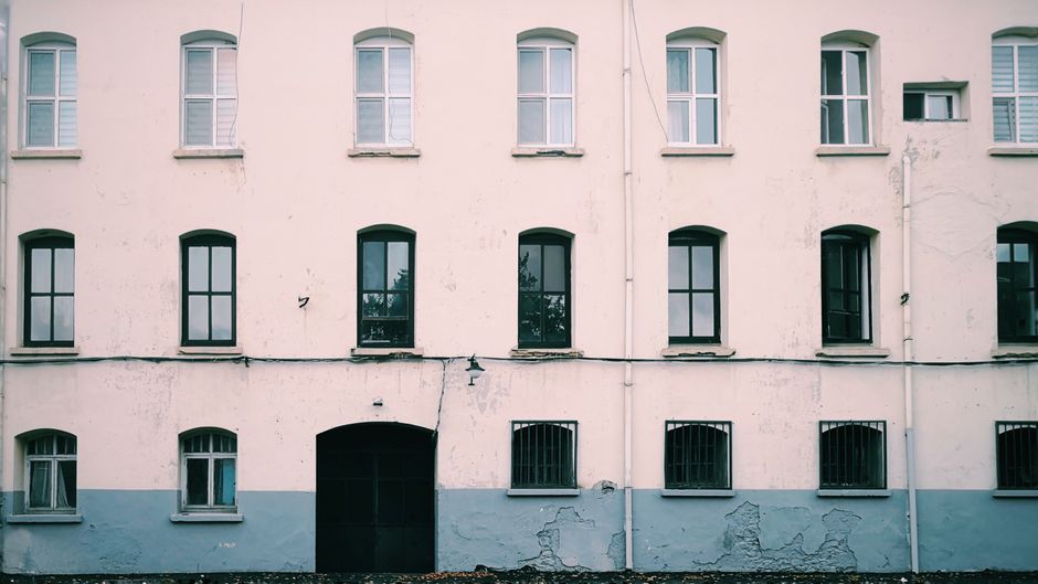 Painted house facade with window trim